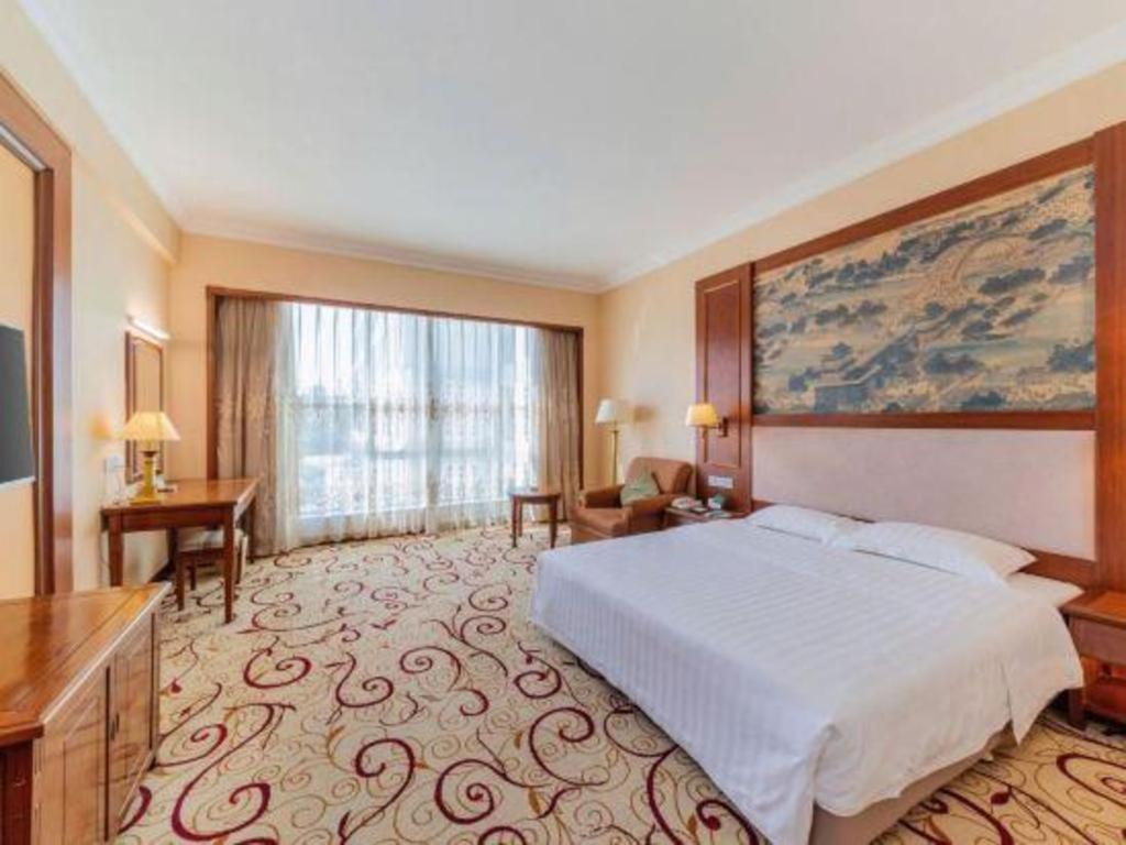 Fenggang Gladden Hotel Tiantangwei Exterior foto