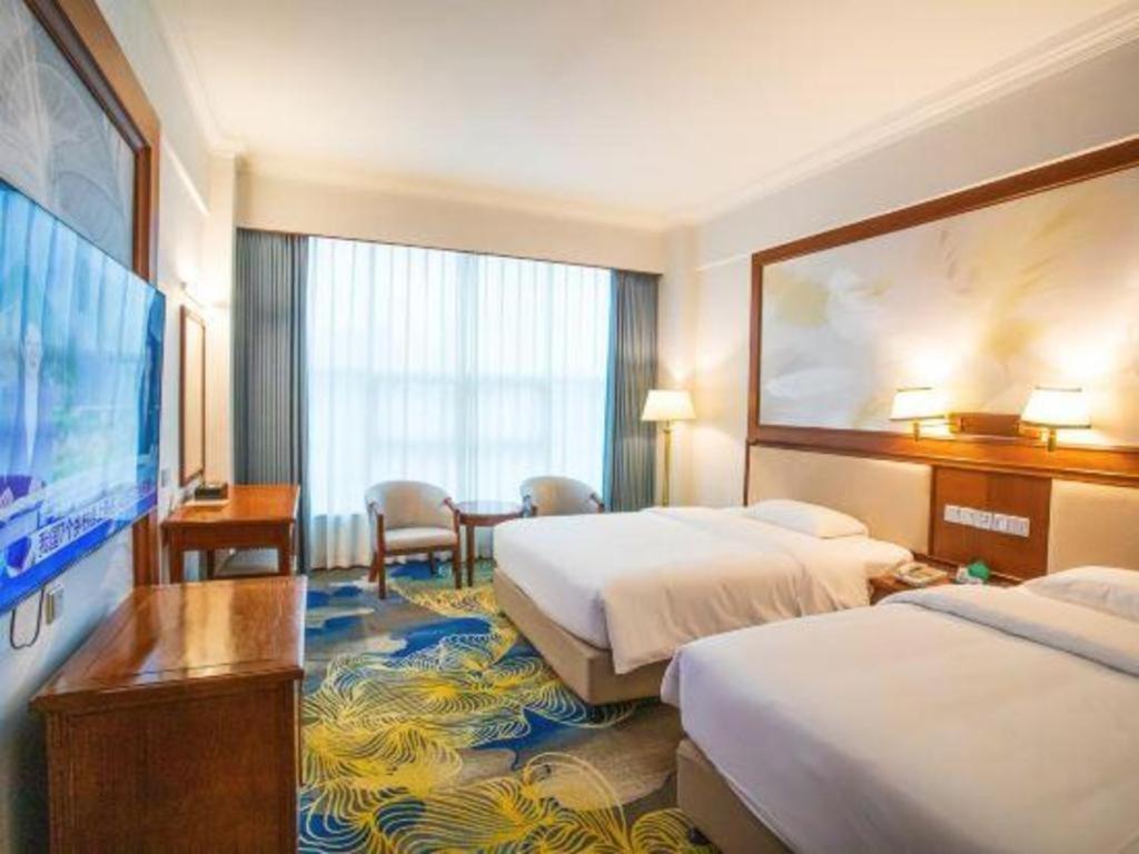 Fenggang Gladden Hotel Tiantangwei Exterior foto