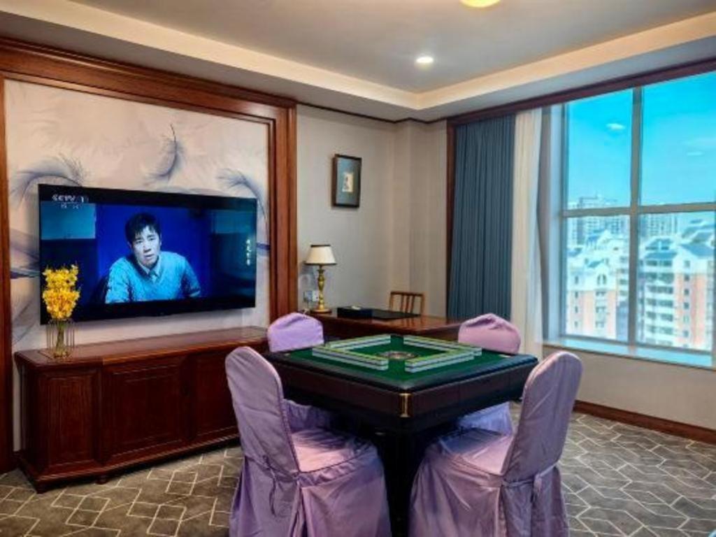 Fenggang Gladden Hotel Tiantangwei Exterior foto