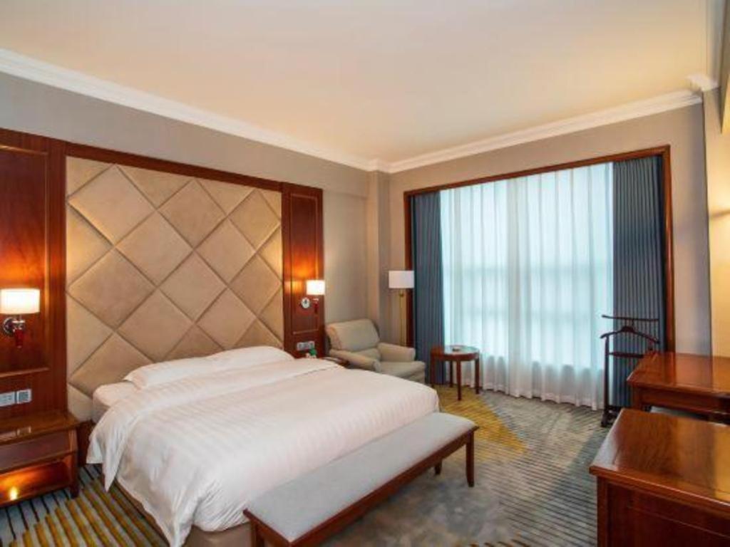 Fenggang Gladden Hotel Tiantangwei Exterior foto