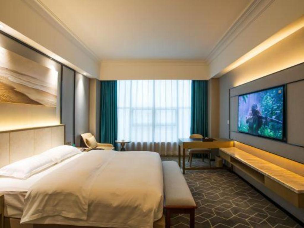 Fenggang Gladden Hotel Tiantangwei Exterior foto