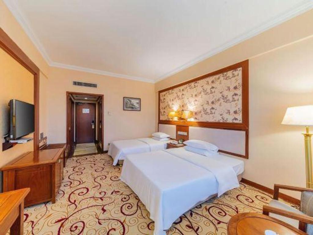 Fenggang Gladden Hotel Tiantangwei Exterior foto