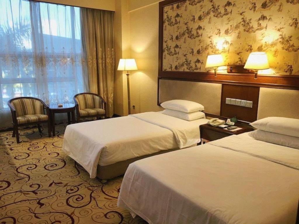 Fenggang Gladden Hotel Tiantangwei Exterior foto
