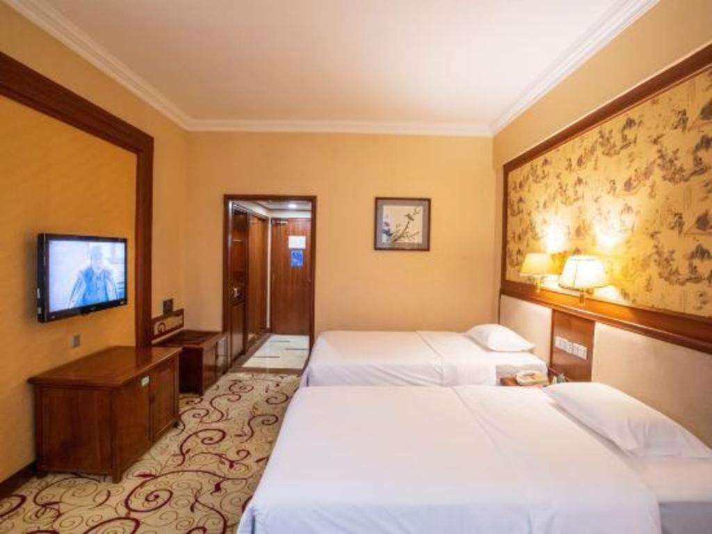 Fenggang Gladden Hotel Tiantangwei Exterior foto