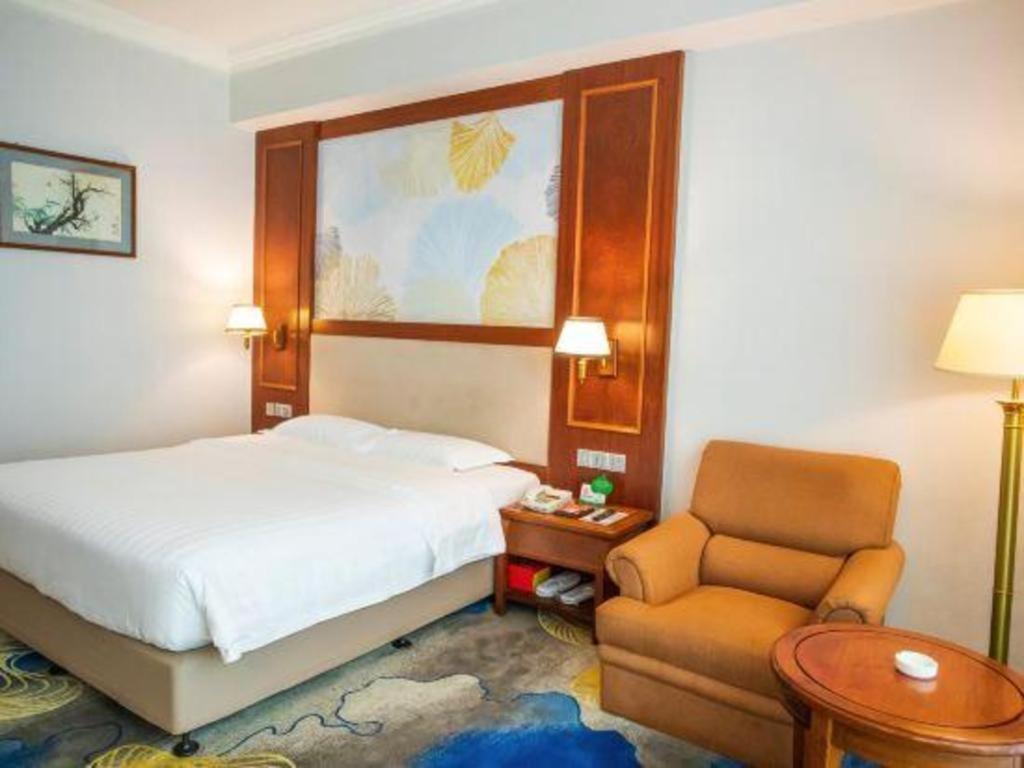 Fenggang Gladden Hotel Tiantangwei Exterior foto