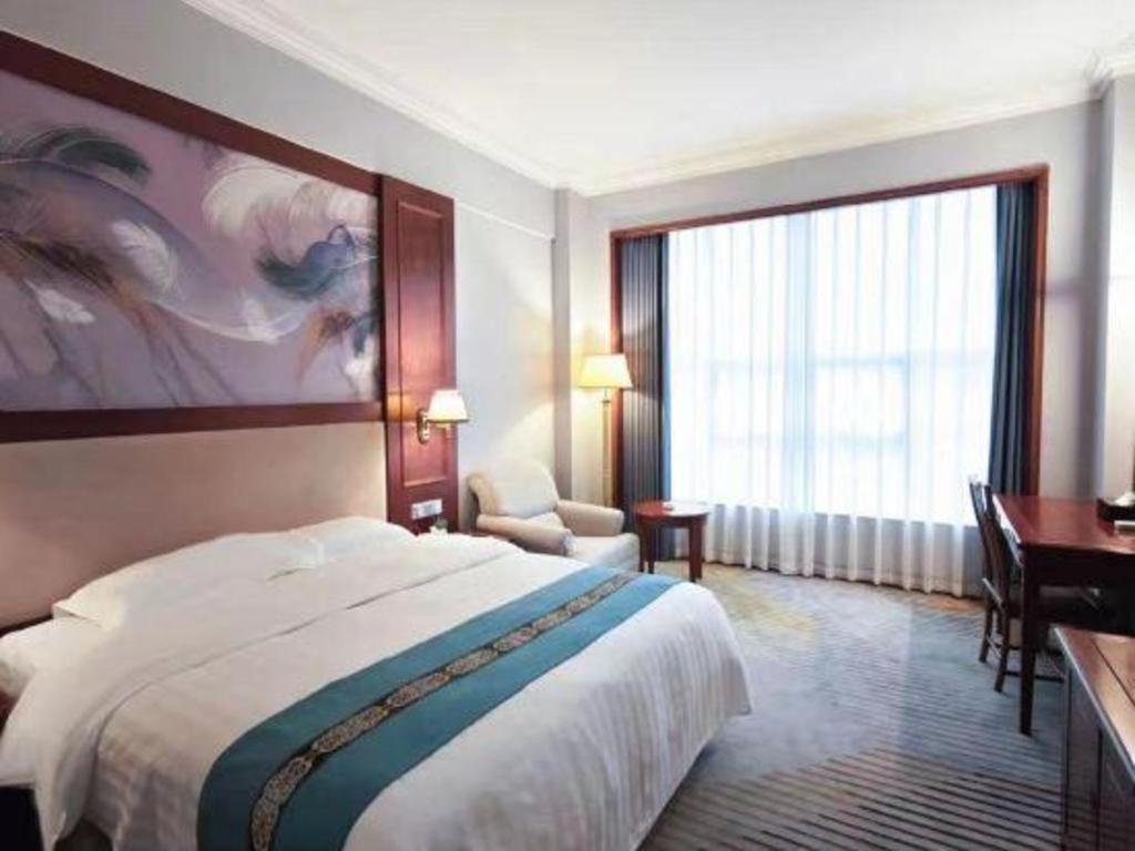 Fenggang Gladden Hotel Tiantangwei Exterior foto