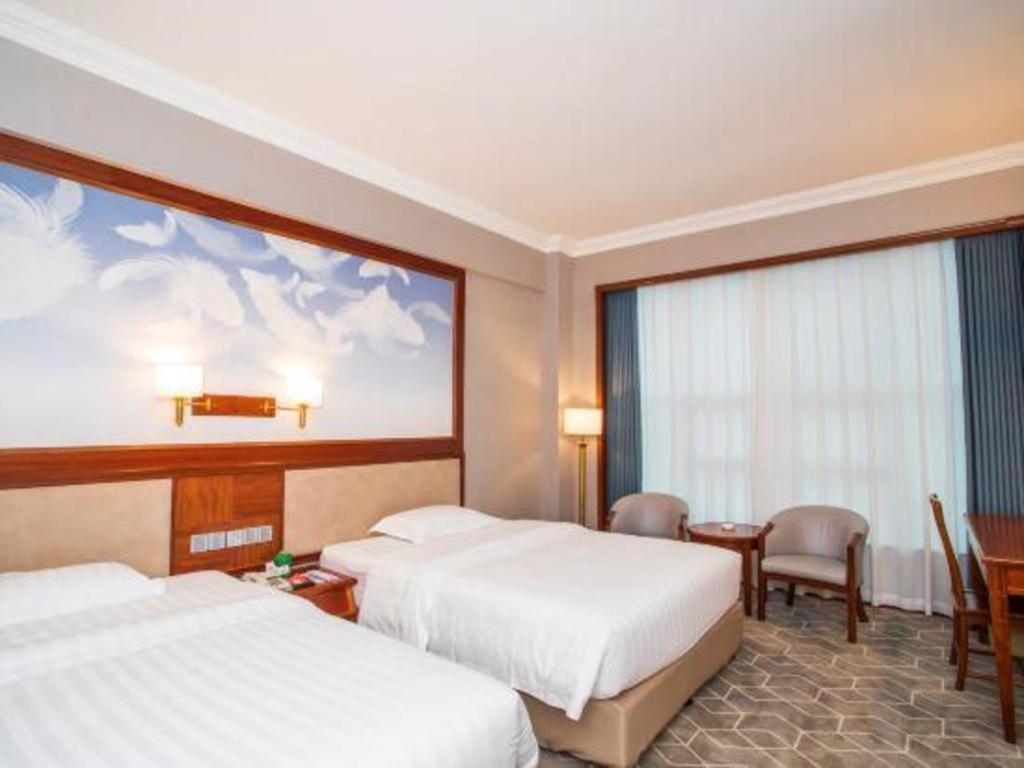 Fenggang Gladden Hotel Tiantangwei Exterior foto